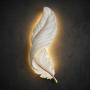 Close-up of feather LED wall lamp glowing with warm halo at night
